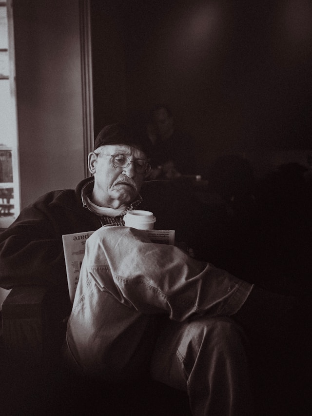 kindness story of a lonely man at a café table